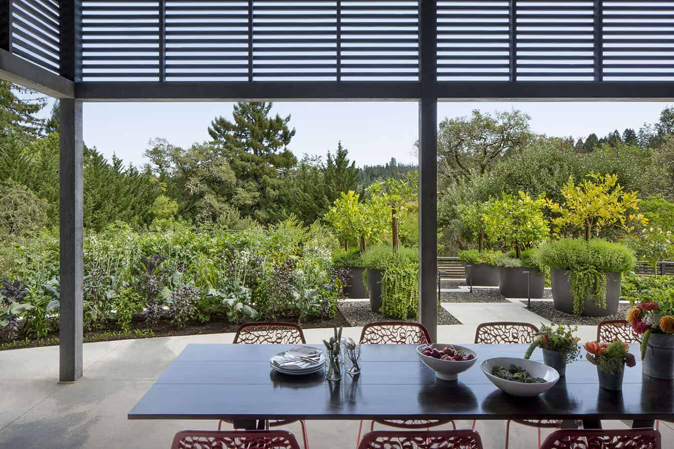 A table with chairs and bowls on it