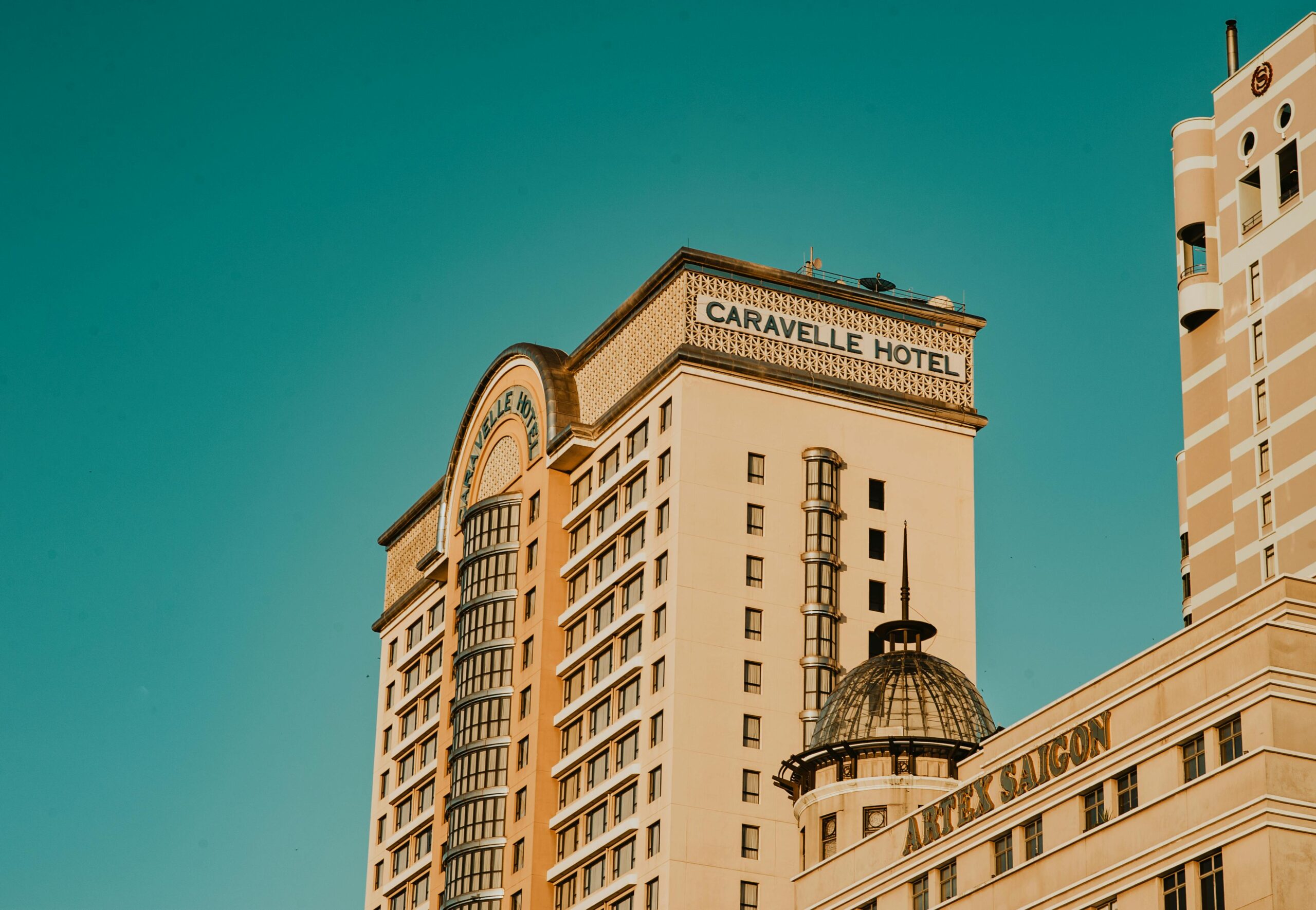 A tall building with a clock on the top of it.